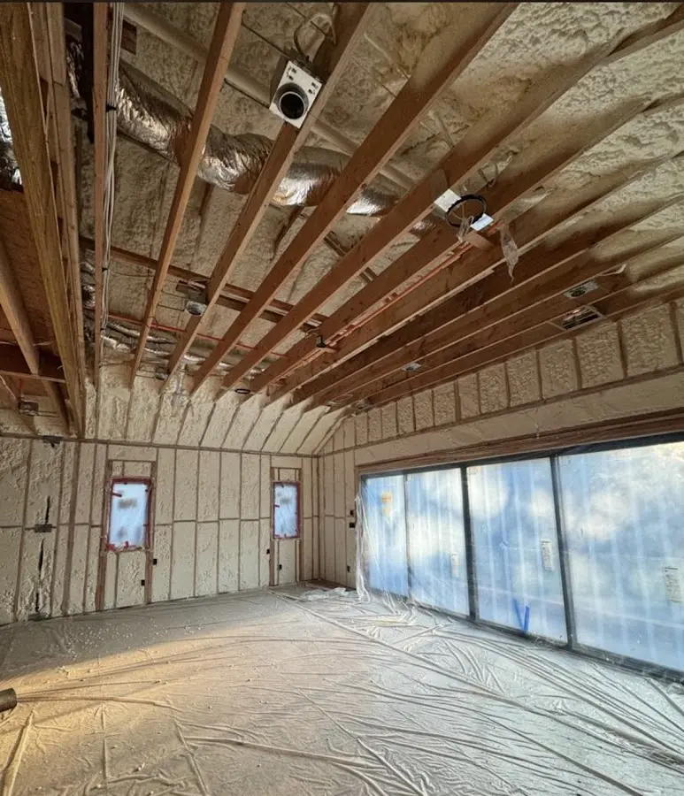 Interior walls and ceiling insulated with spray foam during new construction in Morris